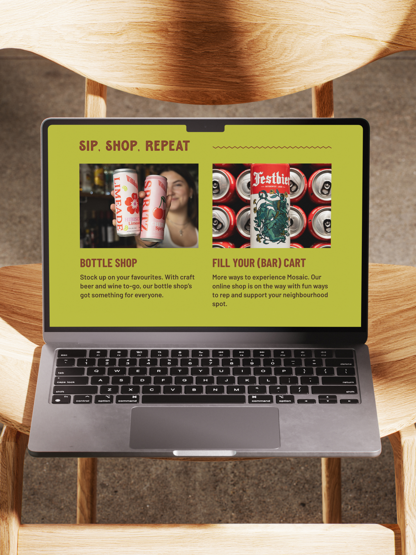 Photo of a laptop, showcasing the Mosaic website on the screen