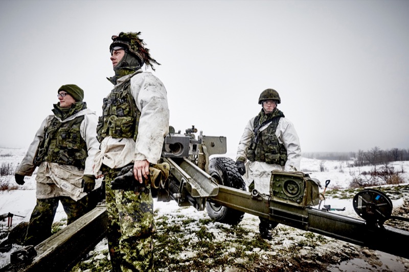 Army unit members dressed in camouflage gear
